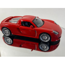 Модель автомобиля Porsche Carrera GT (1/36)