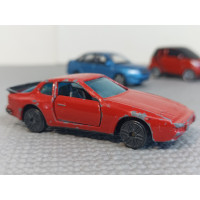 Модель автомобиля Porsche 944 (1/64) Модель автомобиля Porsche 944 (1/64)